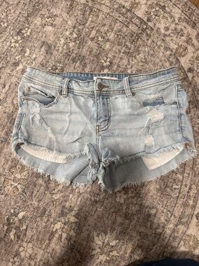 eunina Light Blue Distressed Denim Cutoff Shorts